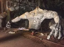 A metal-framed narkasur being made in pieces before it can be reassembled on its display site.